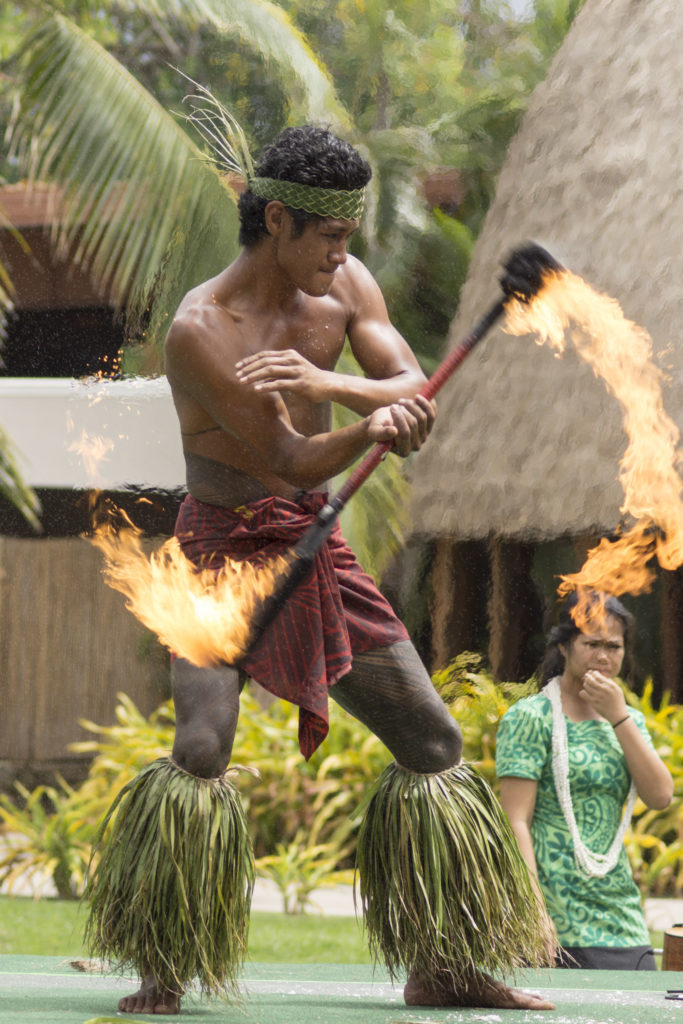 The art of fire dancing, performed at the Polynesian Cultural Center, is exciting both day and night.