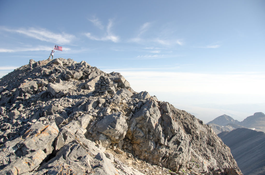 Sam Tobler at the summit on Mount Borah.